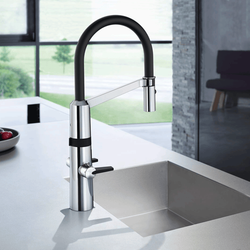 For a kitchen with a large, integrated sink, choosing a higher body faucet with a turning spout is a must.