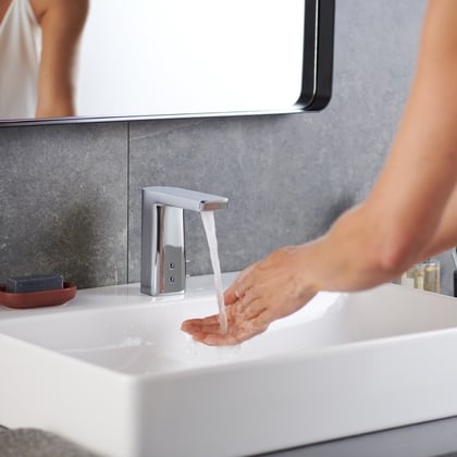 A person washing hands in a sink

Description automatically generated with medium confidence